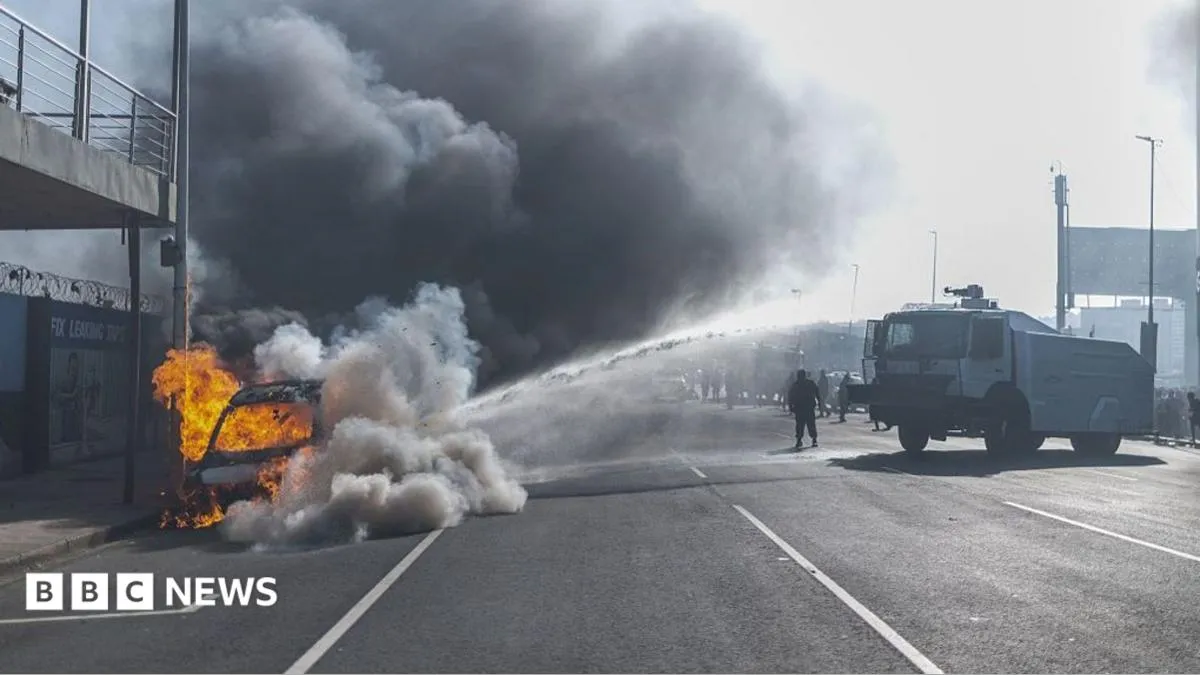 South Africa withdraws asylum order after 24 vehicles burn